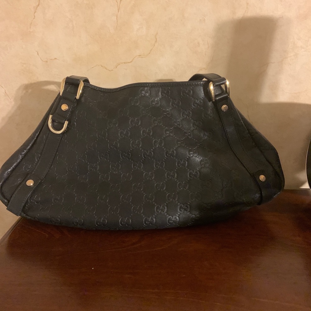 Authentic Gucci black leather gg print purse
